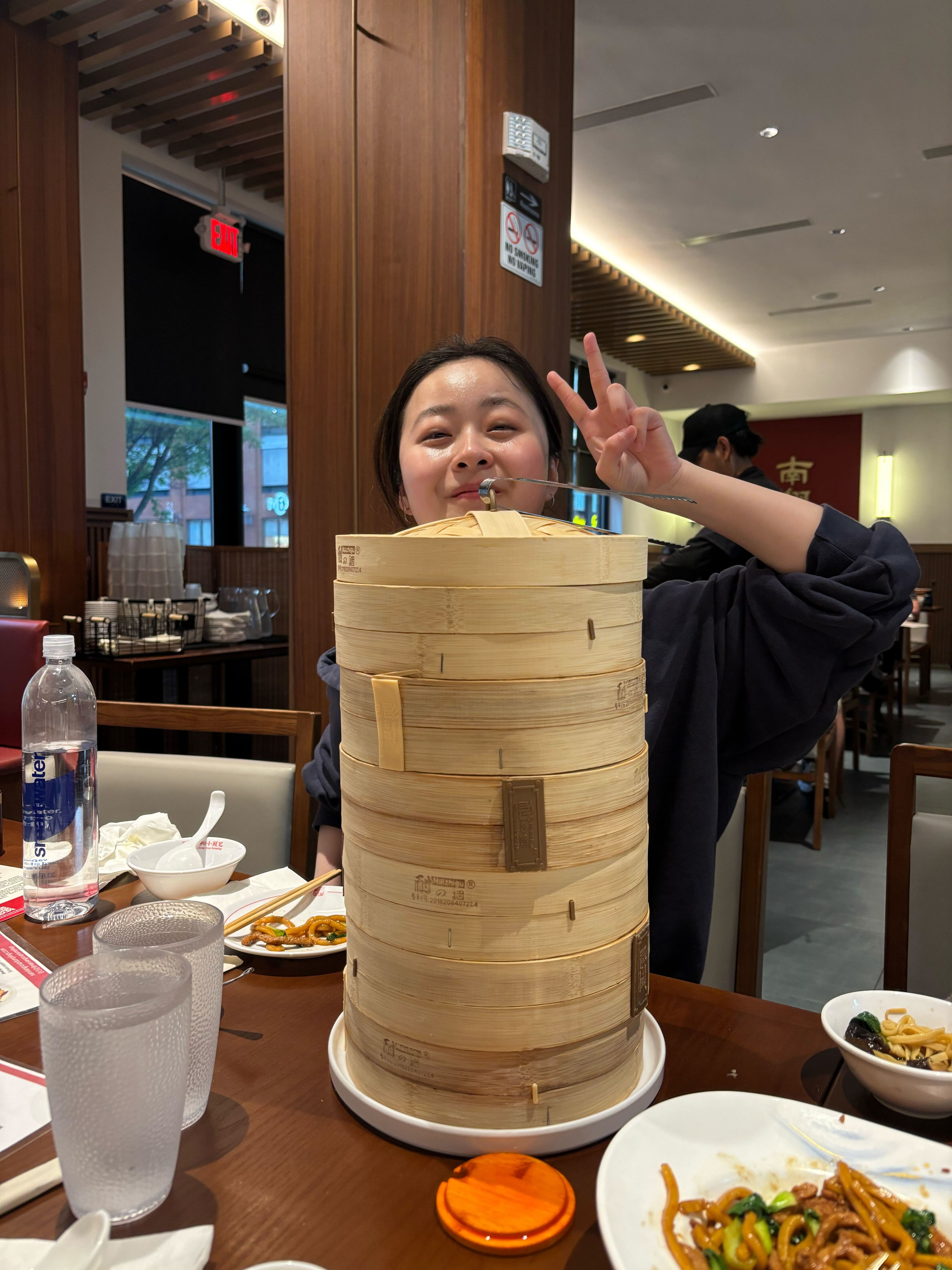 Yuhan with many steamer baskets.